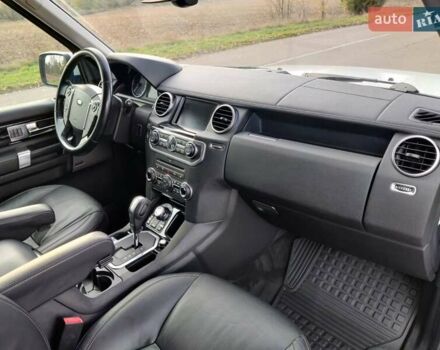 Білий Ленд Ровер Діскавері, об'ємом двигуна 3 л та пробігом 316 тис. км за 14800 $, фото 27 на Automoto.ua