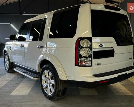 Білий Ленд Ровер Діскавері, об'ємом двигуна 3 л та пробігом 173 тис. км за 22950 $, фото 3 на Automoto.ua