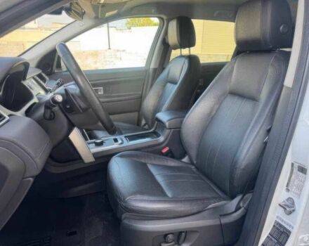 Білий Ленд Ровер Діскавері, об'ємом двигуна 2 л та пробігом 76 тис. км за 9900 $, фото 8 на Automoto.ua