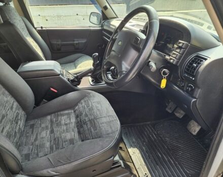 Чорний Ленд Ровер Діскавері, об'ємом двигуна 2.5 л та пробігом 130 тис. км за 6341 $, фото 15 на Automoto.ua