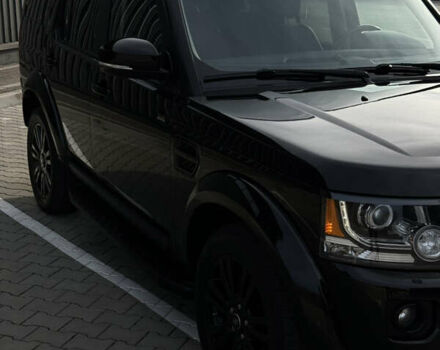 Чорний Ленд Ровер Діскавері, об'ємом двигуна 3 л та пробігом 129 тис. км за 23800 $, фото 4 на Automoto.ua