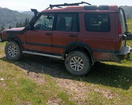Красный Ленд Ровер Дискавери, объемом двигателя 2.5 л и пробегом 240 тыс. км за 9000 $, фото 1 на Automoto.ua