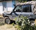 Сірий Ленд Ровер Діскавері, об'ємом двигуна 2 л та пробігом 404 тис. км за 1827 $, фото 2 на Automoto.ua