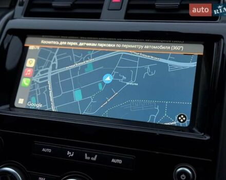 Сірий Ленд Ровер Діскавері, об'ємом двигуна 2 л та пробігом 83 тис. км за 42000 $, фото 13 на Automoto.ua