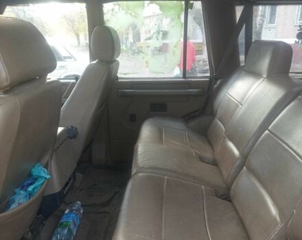 Зелений Ленд Ровер Діскавері, об'ємом двигуна 2.5 л та пробігом 300 тис. км за 1790 $, фото 12 на Automoto.ua