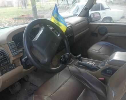 Зелений Ленд Ровер Діскавері, об'ємом двигуна 2.5 л та пробігом 300 тис. км за 1790 $, фото 11 на Automoto.ua