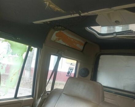 Зелений Ленд Ровер Діскавері, об'ємом двигуна 2.5 л та пробігом 300 тис. км за 1790 $, фото 9 на Automoto.ua