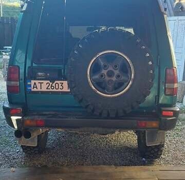 Зелений Ленд Ровер Діскавері, об'ємом двигуна 3.95 л та пробігом 350 тис. км за 8500 $, фото 2 на Automoto.ua