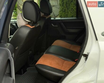 Білий Ленд Ровер Freelander, об'ємом двигуна 2.18 л та пробігом 295 тис. км за 13700 $, фото 21 на Automoto.ua