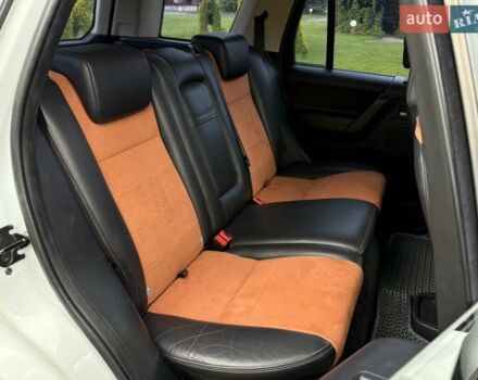 Білий Ленд Ровер Freelander, об'ємом двигуна 2.18 л та пробігом 295 тис. км за 13700 $, фото 25 на Automoto.ua