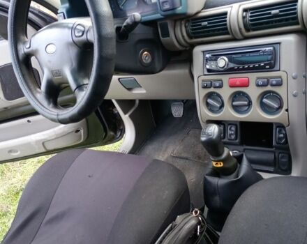 Черный Ленд Ровер Фрилендер, объемом двигателя 1.8 л и пробегом 320 тыс. км за 4650 $, фото 10 на Automoto.ua