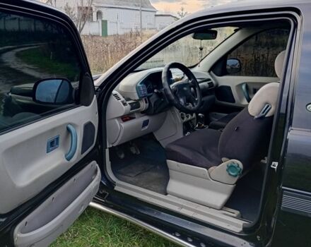 Черный Ленд Ровер Фрилендер, объемом двигателя 1.8 л и пробегом 320 тыс. км за 4650 $, фото 6 на Automoto.ua