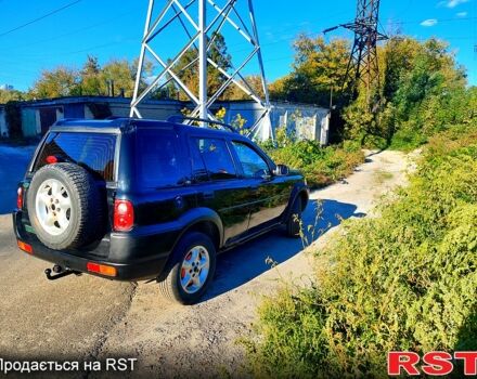 Черный Ленд Ровер Фрилендер, объемом двигателя 1.8 л и пробегом 270 тыс. км за 1950 $, фото 2 на Automoto.ua