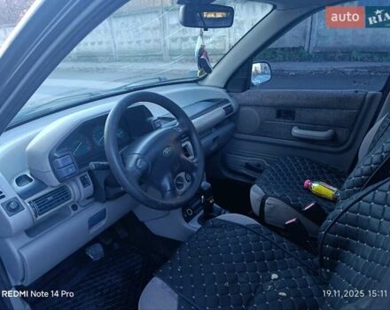 Черный Ленд Ровер Фрилендер, объемом двигателя 2 л и пробегом 300 тыс. км за 1999 $, фото 4 на Automoto.ua