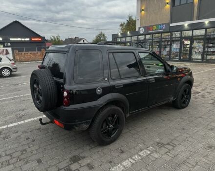 Черный Ленд Ровер Фрилендер, объемом двигателя 2 л и пробегом 100 тыс. км за 4590 $, фото 6 на Automoto.ua