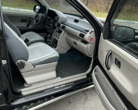 Чорний Ленд Ровер Freelander, об'ємом двигуна 1.8 л та пробігом 176 тис. км за 5990 $, фото 36 на Automoto.ua