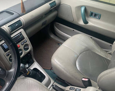 Чорний Ленд Ровер Freelander, об'ємом двигуна 1.99 л та пробігом 374 тис. км за 5600 $, фото 5 на Automoto.ua