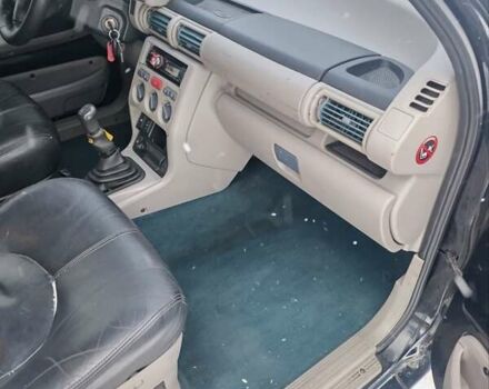 Черный Ленд Ровер Фрилендер, объемом двигателя 1.8 л и пробегом 222 тыс. км за 7500 $, фото 6 на Automoto.ua