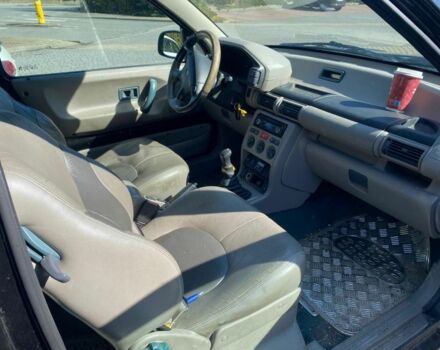 Чорний Ленд Ровер Freelander, об'ємом двигуна 2 л та пробігом 243 тис. км за 1875 $, фото 4 на Automoto.ua