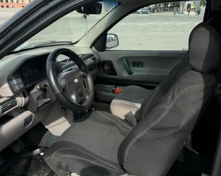Чорний Ленд Ровер Freelander, об'ємом двигуна 2 л та пробігом 300 тис. км за 2353 $, фото 4 на Automoto.ua