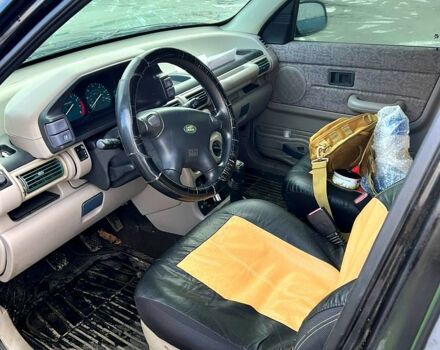 Черный Ленд Ровер Фрилендер, объемом двигателя 1.8 л и пробегом 200 тыс. км за 3300 $, фото 9 на Automoto.ua