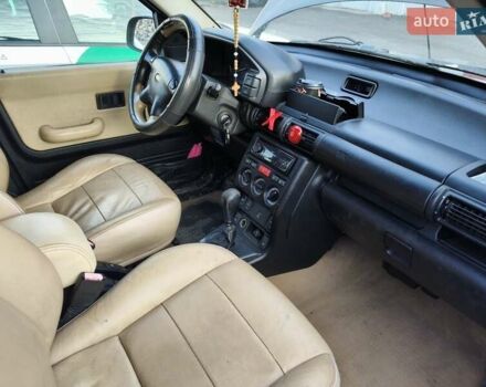 Черный Ленд Ровер Фрилендер, объемом двигателя 2.5 л и пробегом 305 тыс. км за 3300 $, фото 3 на Automoto.ua