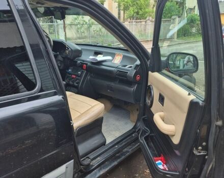Чорний Ленд Ровер Freelander, об'ємом двигуна 2.5 л та пробігом 323 тис. км за 5000 $, фото 7 на Automoto.ua
