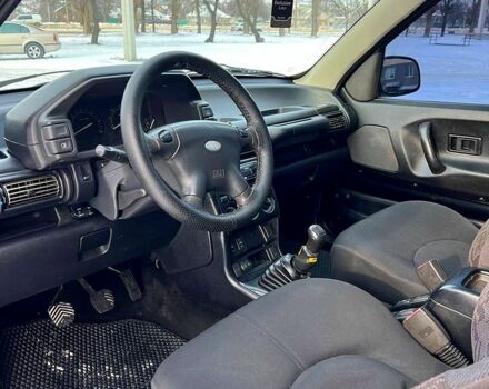 Черный Ленд Ровер Фрилендер, объемом двигателя 2 л и пробегом 235 тыс. км за 6500 $, фото 9 на Automoto.ua