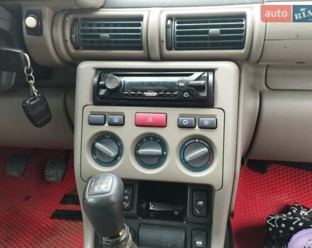 Червоний Ленд Ровер Freelander, об'ємом двигуна 2 л та пробігом 290 тис. км за 5000 $, фото 3 на Automoto.ua