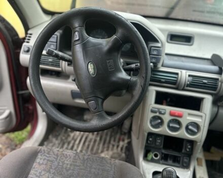 Красный Ленд Ровер Фрилендер, объемом двигателя 1.8 л и пробегом 200 тыс. км за 1657 $, фото 3 на Automoto.ua