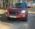 Червоний Ленд Ровер Freelander, об'ємом двигуна 2.2 л та пробігом 371 тис. км за 8600 $, фото 1 на Automoto.ua