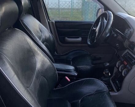 Серый Ленд Ровер Фрилендер, объемом двигателя 1.8 л и пробегом 238 тыс. км за 5000 $, фото 4 на Automoto.ua