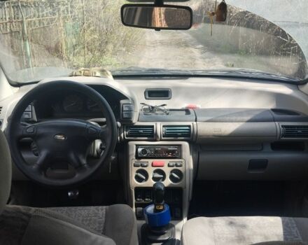 Сірий Ленд Ровер Freelander, об'ємом двигуна 2 л та пробігом 280 тис. км за 3800 $, фото 4 на Automoto.ua