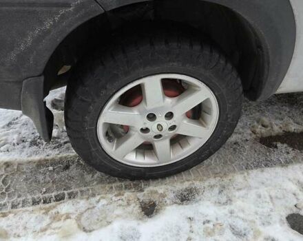 Сірий Ленд Ровер Freelander, об'ємом двигуна 2 л та пробігом 170 тис. км за 7000 $, фото 4 на Automoto.ua