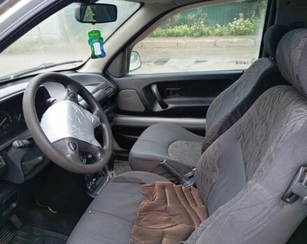 Сірий Ленд Ровер Freelander, об'ємом двигуна 2 л та пробігом 200 тис. км за 2456 $, фото 4 на Automoto.ua
