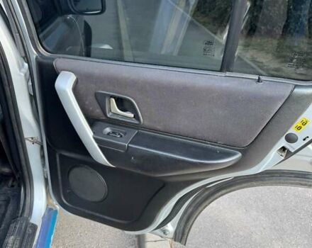 Сірий Ленд Ровер Freelander, об'ємом двигуна 1.95 л та пробігом 211 тис. км за 7000 $, фото 19 на Automoto.ua