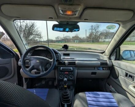 Синий Ленд Ровер Фрилендер, объемом двигателя 2 л и пробегом 250 тыс. км за 3500 $, фото 4 на Automoto.ua