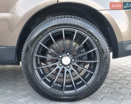 Коричневый Ленд Ровер Рендж Ровер Спорт, объемом двигателя 3 л и пробегом 239 тыс. км за 15799 $, фото 14 на Automoto.ua