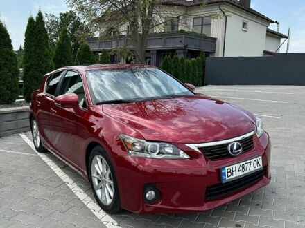 Красный Лексус СТ, объемом двигателя 1.8 л и пробегом 250 тыс. км за 12500 $, фото 1 на Automoto.ua