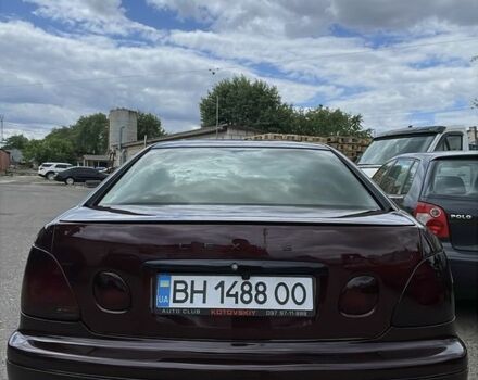 Красный Лексус ГС, объемом двигателя 3 л и пробегом 267 тыс. км за 6000 $, фото 2 на Automoto.ua