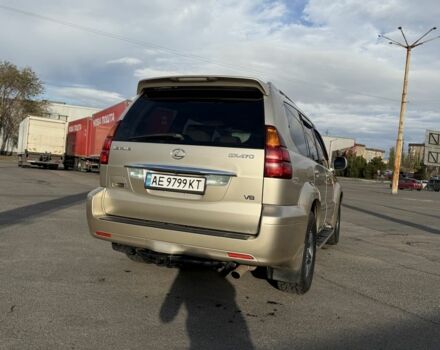 Бежевый Лексус ГХ, объемом двигателя 4.7 л и пробегом 247 тыс. км за 13950 $, фото 3 на Automoto.ua