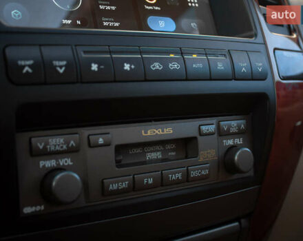 Бежевий Лексус ГХ, об'ємом двигуна 4.7 л та пробігом 203 тис. км за 18500 $, фото 24 на Automoto.ua