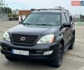 Черный Лексус ГХ, объемом двигателя 4.66 л и пробегом 240 тыс. км за 10555 $, фото 1 на Automoto.ua