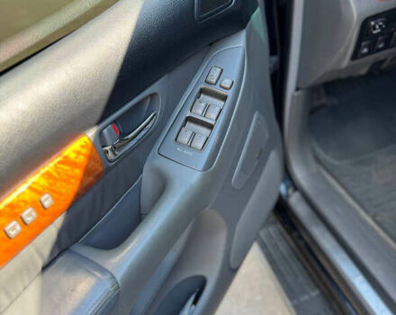 Черный Лексус ГХ, объемом двигателя 4.66 л и пробегом 245 тыс. км за 14200 $, фото 10 на Automoto.ua