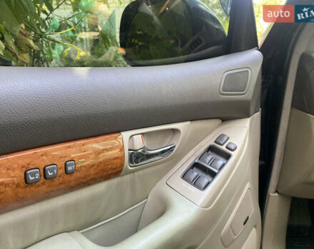 Черный Лексус ГХ, объемом двигателя 4.7 л и пробегом 186 тыс. км за 13900 $, фото 3 на Automoto.ua