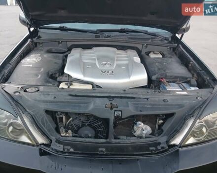 Черный Лексус ГХ, объемом двигателя 4.66 л и пробегом 253 тыс. км за 15300 $, фото 2 на Automoto.ua