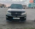 Черный Лексус ГХ, объемом двигателя 4.66 л и пробегом 253 тыс. км за 15300 $, фото 1 на Automoto.ua