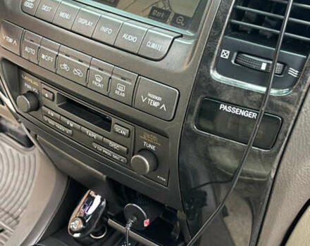 Черный Лексус ГХ, объемом двигателя 4.66 л и пробегом 234 тыс. км за 14000 $, фото 12 на Automoto.ua