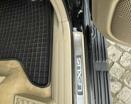 Черный Лексус ГХ, объемом двигателя 4.66 л и пробегом 235 тыс. км за 14600 $, фото 7 на Automoto.ua