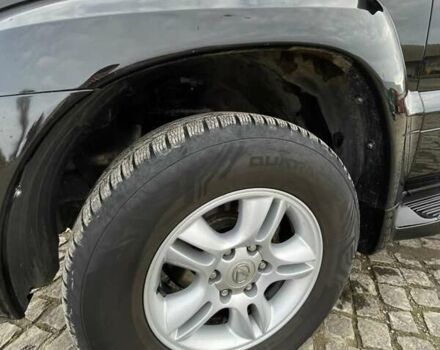 Черный Лексус ГХ, объемом двигателя 4.66 л и пробегом 235 тыс. км за 14600 $, фото 1 на Automoto.ua